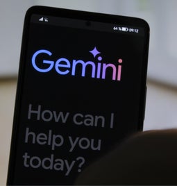 Mobile device showing Google Gemini logo and intro