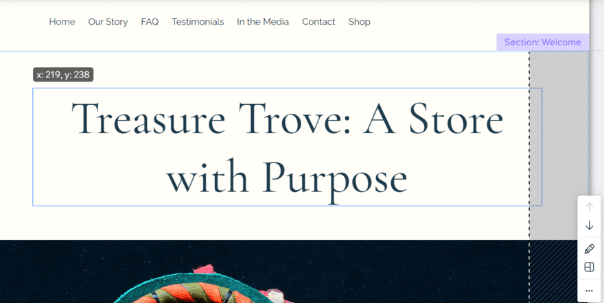 Wix's drag-and-drop editor in use, moving a text box on the homepage